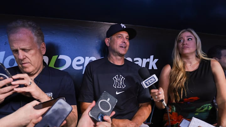 Aug 1, 2025; Miami, Florida, USA; New York Yankees manager Aaron Boone (17) speaks to reporters before the game against the Miami Marlins at loanDepot Park. Mandatory Credit: Sam Navarro-Imagn Images