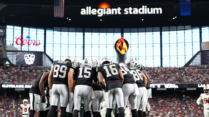 Sep 29, 2024; Paradise, Nevada, USA; The Las Vegas Raiders huddle up before a play against the Cleveland Browns during the third quarter at Allegiant Stadium. Mandatory Credit: Stephen R. Sylvanie-Imagn Images