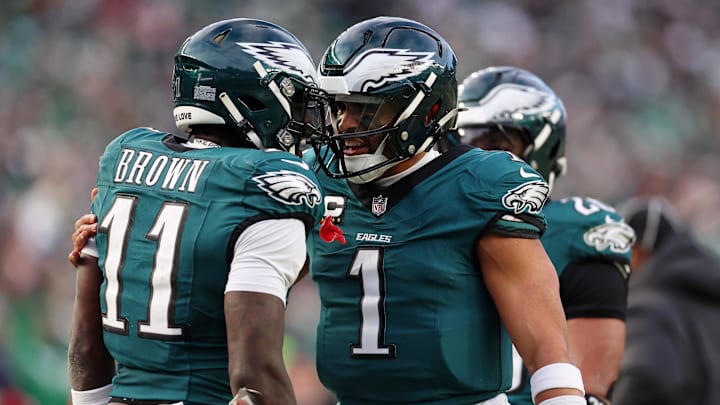 Jan 26, 2025; Philadelphia, PA, USA; Philadelphia Eagles quarterback Jalen Hurts (1) and wide receiver A.J. Brown (11) celebrate after a touchdown against the Washington Commanders during the first half in the NFC Championship game at Lincoln Financial Field. Mandatory Credit: Bill Streicher-Imagn Images