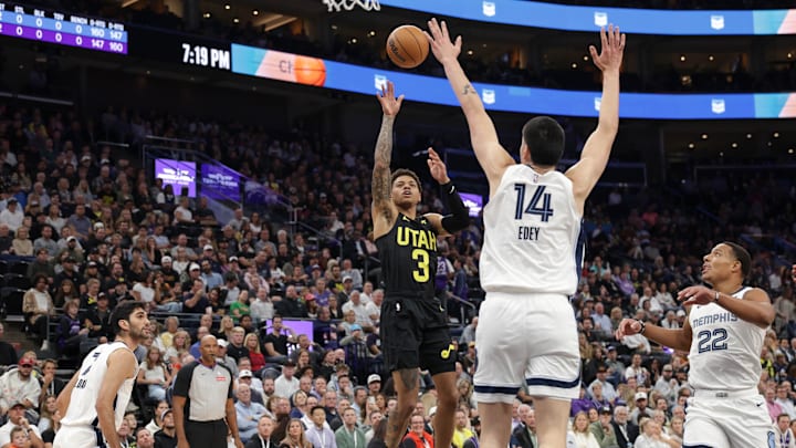 Oct 23, 2024; Salt Lake City, Utah, USA; Utah Jazz guard Keyonte George (3) shoots the ball over Memphis Grizzlies center Zach Edey (14) during the first quarter at Delta Center. Mandatory Credit: Chris Nicoll-Imagn Images Oct 23, 2024; Salt Lake City, Utah, USA; Utah Jazz guard Keyonte George (3) shoots the ball over Memphis Grizzlies center Zach Edey (14) during the first quarter at Delta Center. Mandatory Credit: Chris Nicoll-Imagn Images
