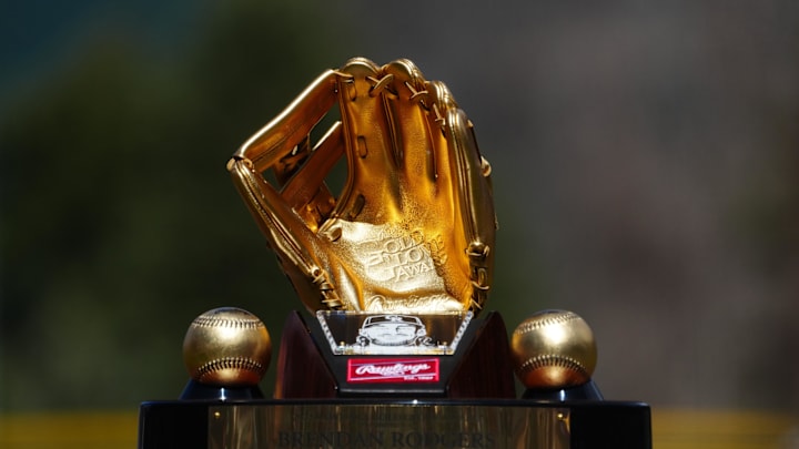 Apr 9, 2023; Denver, Colorado, USA; Detailed view of the Gold Glove award for Colorado Rockies infielder Brendan Rodgers (7) (not pictured before the game Washington Nationals at Coors Field. Mandatory Credit: Ron Chenoy-Imagn Images