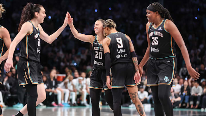 May 17, 2025; Brooklyn, New York, USA; New York Liberty guard Sabrina Ionescu (20) celebrates with forward Breanna Stewart (30), guard Natasha Cloud (9) and center Jonquel Jones (35) after getting fouled on a made basket in the fourth quarter against the Las Vegas Aces at Barclays Center. Mandatory Credit: Wendell Cruz-Imagn Images May 17, 2025; Brooklyn, New York, USA; New York Liberty guard Sabrina Ionescu (20) celebrates with forward Breanna Stewart (30), guard Natasha Cloud (9) and center Jonquel Jones (35) after getting fouled on a made basket in the fourth quarter against the Las Vegas Aces at Barclays Center. Mandatory Credit: Wendell Cruz-Imagn Images