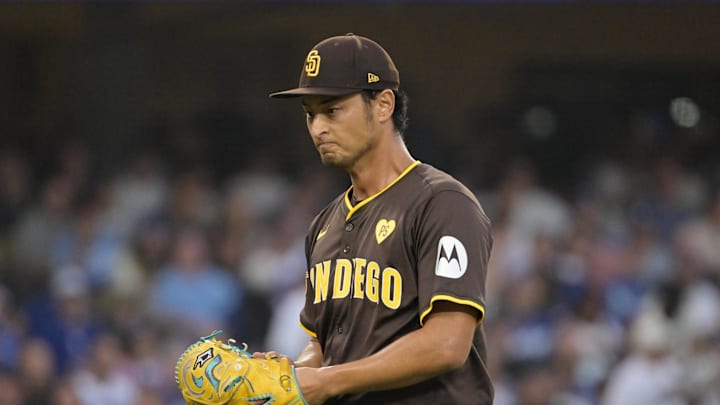 Oct 11, 2024; Los Angeles, California, USA; San Diego Padres pitcher Yu Darvish (11) reacts in the fourth inning against the Los Angeles Dodgers during game five of the NLDS for the 2024 MLB Playoffs at Dodger Stadium. Mandatory Credit: Jayne Kamin-Oncea-Imagn Images Oct 11, 2024; Los Angeles, California, USA; San Diego Padres pitcher Yu Darvish (11) reacts in the fourth inning against the Los Angeles Dodgers during game five of the NLDS for the 2024 MLB Playoffs at Dodger Stadium. Mandatory Credit: Jayne Kamin-Oncea-Imagn Images