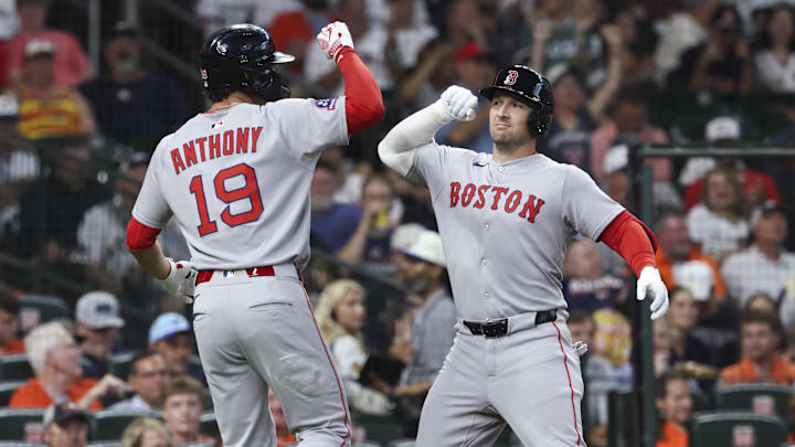 Aug 11, 2025; Houston, Texas, USA; Boston Red Sox third baseman Alex Bregman (2) celebrates with designated hitter Roman Anthony (19) after hitting a home run during the first inning against the Houston Astros at Daikin Park. Mandatory Credit: Troy Taormina-Imagn Images
