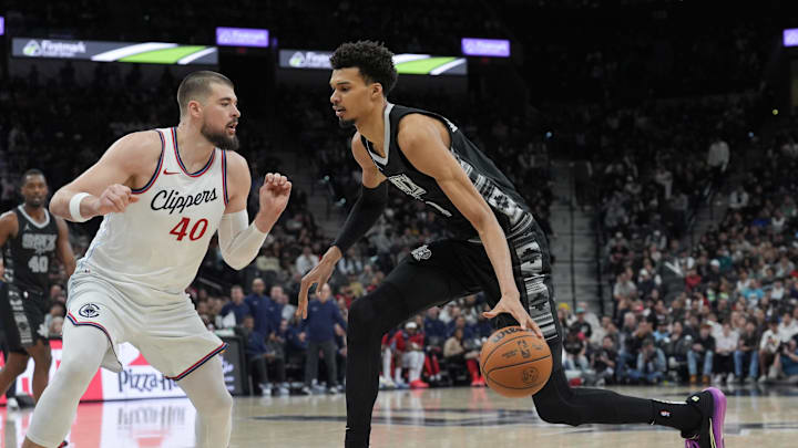 Jan 29, 2025; San Antonio, Texas, USA; San Antonio Spurs center Victor Wembanyama (1) dribbles against LA Clippers center Ivica Zubac (40) in the second half at Frost Bank Center. Mandatory Credit: Daniel Dunn-Imagn Images Jan 29, 2025; San Antonio, Texas, USA; San Antonio Spurs center Victor Wembanyama (1) dribbles against LA Clippers center Ivica Zubac (40) in the second half at Frost Bank Center. Mandatory Credit: Daniel Dunn-Imagn Images