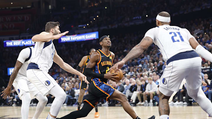 Nov 17, 2024; Oklahoma City, Oklahoma, USA; Oklahoma City Thunder guard Shai Gilgeous-Alexander (2) drives to the basket against the Dallas Mavericks during the second half at Paycom Center. Mandatory Credit: Alonzo Adams-Imagn Images