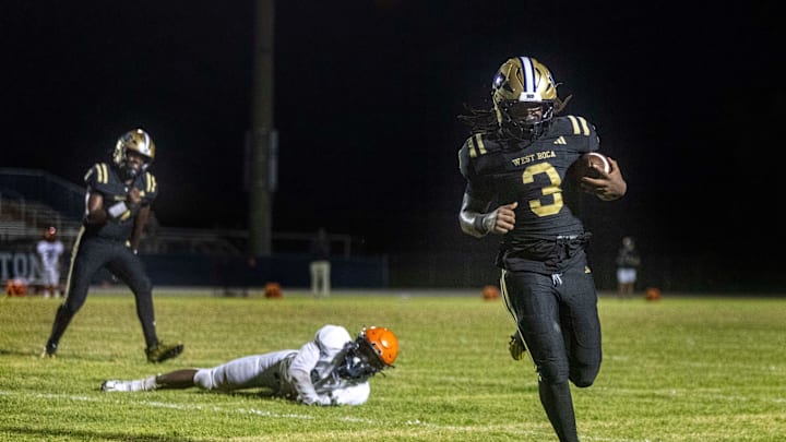West Boca's Javian Mallory scores the winning touchdown to defeat Benjamin 14-13 during their game on August 22, 2024 in Boca Raton, Florida.