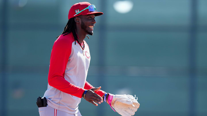 Cincinnati Reds third baseman Elly De La Cruz (44) smile during fielding drills during spring training workouts, Tuesday, Feb. 20, 2024, at the team  s spring training facility in Goodyear, Ariz.