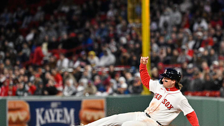 Boston Red Sox first baseman Nick Sogard (20) slides into second base against the New York Mets during the fifth inning at Fenway Park on May 21. Boston Red Sox first baseman Nick Sogard (20) slides into second base against the New York Mets during the fifth inning at Fenway Park on May 21.