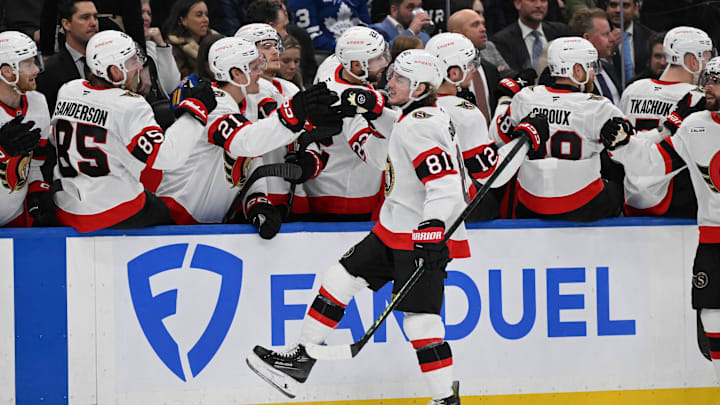 Apr 22, 2025; Toronto, Ontario, CAN;  Ottawa Senators forward Adam Gaudette (81) celebrates with team mates after scoring a goal against the Toronto Maple Leafs in the third period in game two of the first round of the 2025 Stanley Cup Playoffs at Scotiabank Arena. Mandatory Credit: Dan Hamilton-Imagn Images