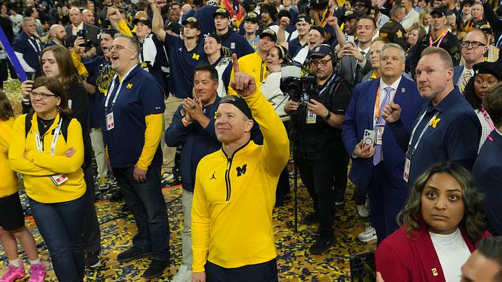 Apr 6, 2026; Indianapolis, IN, USA; Michigan Wolverines head coach Dusty May watches One Shining Moment after defeating the Connecticut Huskies in the national championship of the Final Four of the men's 2026 NCAA Tournament at Lucas Oil Stadium. Mandatory Credit: Robert Deutsch-Imagn Images