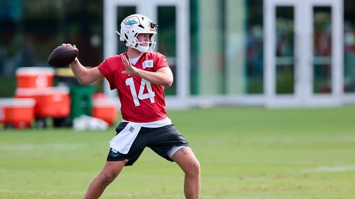Miami Dolphins quarterback Quinn Ewers (14) works during practice at the Baptist Health Training Complex. Miami Dolphins quarterback Quinn Ewers (14) works during practice at the Baptist Health Training Complex.