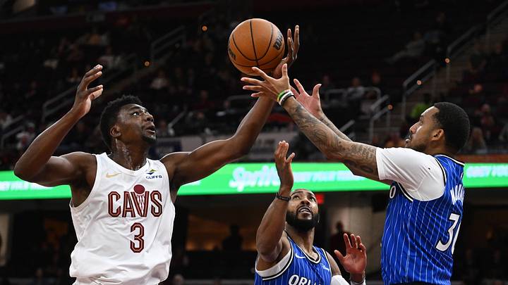Oct 11, 2026; Cleveland, Ohio, USA; Cleveland Cavaliers center Thomas Bryant (3) goes for a rebound against Orlando Magic guard Alex Morales (30) and guard Jevon Carter (2) during the second half at Rocket Arena. Mandatory Credit: Ken Blaze-Imagn Images Oct 11, 2026; Cleveland, Ohio, USA; Cleveland Cavaliers center Thomas Bryant (3) goes for a rebound against Orlando Magic guard Alex Morales (30) and guard Jevon Carter (2) during the second half at Rocket Arena. Mandatory Credit: Ken Blaze-Imagn Images