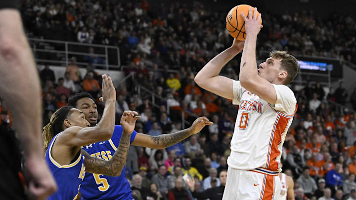 Mar 20, 2025; Providence, RI, USA; Clemson Tigers center Viktor Lakhin (0) shoots the ball against the McNeese State Cowboys during the first half at Amica Mutual Pavilion. Mandatory Credit: Eric Canha-Imagn Images