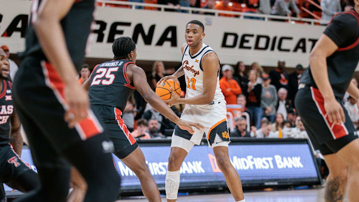 Mar 5, 2024; Stillwater, Oklahoma, USA; Oklahoma State Cowboys center Brandon Garrison (23) looks to