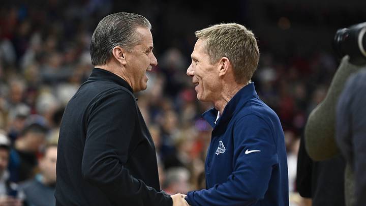 Nov 20, 2022; Spokane, Washington, USA; Kentucky Wildcats head coach John Calipari, left, shakes hands with Gonzaga Bulldogs head coach Mark Few before a game at Spokane Arena. 