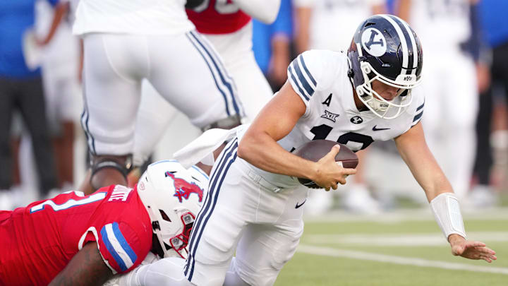 Jake Retzlaff falls as the pocket collapses against SMU.