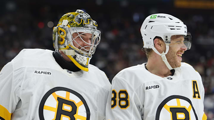 Feb 28, 2026; Philadelphia, Pennsylvania, USA; Boston Bruins goalie Jeremy Swayman (1) reacts with right wing David Pastrnak (88) against the Philadelphia Flyers in the second period at Xfinity Mobile Arena. Mandatory Credit: Kyle Ross-Imagn Images