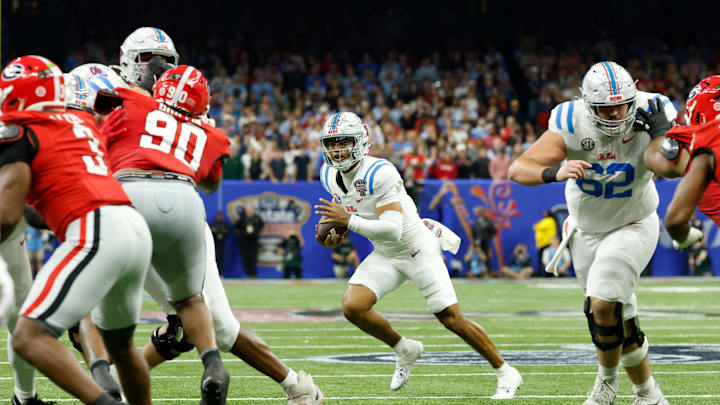 Jan 1, 2026; New Orleans, LA, USA; Mississippi Rebels quarterback Trinidad Chambliss (6) carries the ball against the Georgia Bulldogs in the fourth quarter during the 2025 Sugar Bowl and quarterfinal game of the College Football Playoff at Caesars Superdome. Mandatory Credit: Amber Searls-Imagn Images Jan 1, 2026; New Orleans, LA, USA; Mississippi Rebels quarterback Trinidad Chambliss (6) carries the ball against the Georgia Bulldogs in the fourth quarter during the 2025 Sugar Bowl and quarterfinal game of the College Football Playoff at Caesars Superdome. Mandatory Credit: Amber Searls-Imagn Images