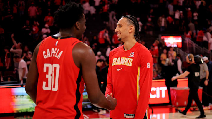 Mar 20, 2026; Houston, Texas, USA; Houston Rockets center Clint Capela (30) talks with Atlanta Hawks forward Zaccharie Risacher (10) following the game at Toyota Center. Mandatory Credit: Erik Williams-Imagn Images Mar 20, 2026; Houston, Texas, USA; Houston Rockets center Clint Capela (30) talks with Atlanta Hawks forward Zaccharie Risacher (10) following the game at Toyota Center. Mandatory Credit: Erik Williams-Imagn Images
