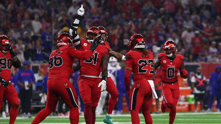 Nov 20, 2025; Houston, Texas, USA; Houston Texans defensive end Will Anderson Jr. (51) celebrates with teammates after sacking Buffalo Bills quarterback Josh Allen (17) in the first half at NRG Stadium. Mandatory Credit: Thomas Shea-Imagn Images