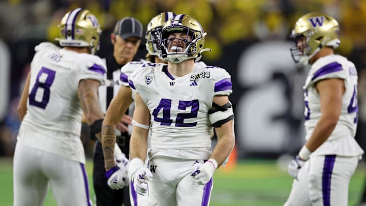 UW linebacker Carson Bruener (42) reacts to a CFP championship game play in January. 