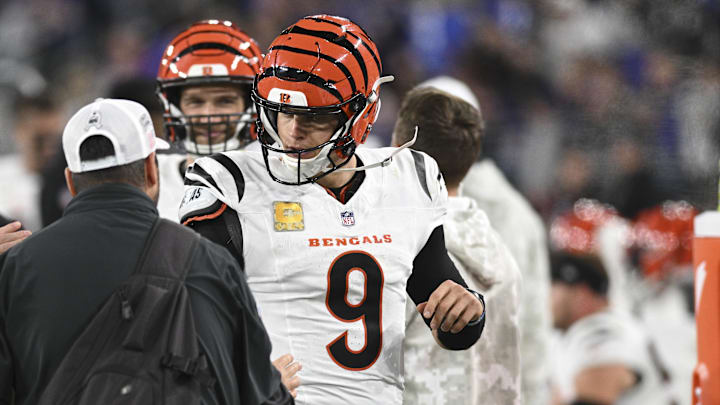 Nov 7, 2024; Baltimore, Maryland, USA; Cincinnati Bengals quarterback Joe Burrow (9) celebrates with teammates after throwing a touchdown during the second half against the Baltimore Ravens at M&T Bank Stadium. Mandatory Credit: Tommy Gilligan-Imagn Nov 7, 2024; Baltimore, Maryland, USA; Cincinnati Bengals quarterback Joe Burrow (9) celebrates with teammates after throwing a touchdown during the second half against the Baltimore Ravens at M&T Bank Stadium. Mandatory Credit: Tommy Gilligan-Imagn