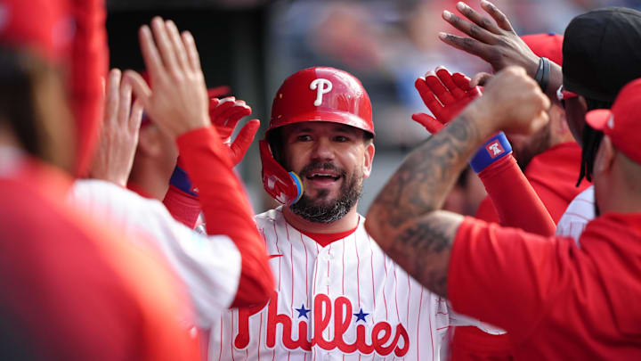Philadelphia Phillies designated hitter Kyle Schwarber (12) celebrates with teammates after hitting a home run.