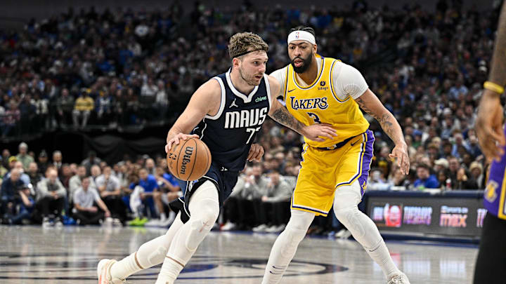 Dec 12, 2023; Dallas, Texas, USA; Dallas Mavericks guard Luka Doncic (77) and Los Angeles Lakers forward Anthony Davis (3) in action during the game between the Dallas Mavericks and the Los Angeles Lakers at the American Airlines Center. Mandatory Credit: Jerome Miron-Imagn Images
