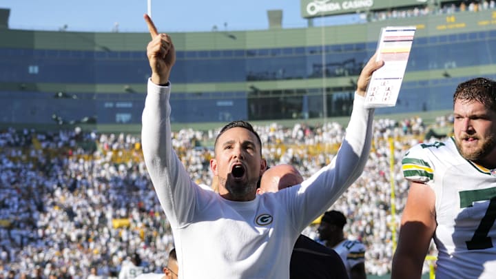 Oct 20, 2024; Green Bay, Wisconsin, USA;  Green Bay Packers head coach Matt LaFleur celebrates while walking off the field following the game against the Houston Texans at Lambeau Field. Mandatory Credit: Jeff Hanisch-Imagn Images