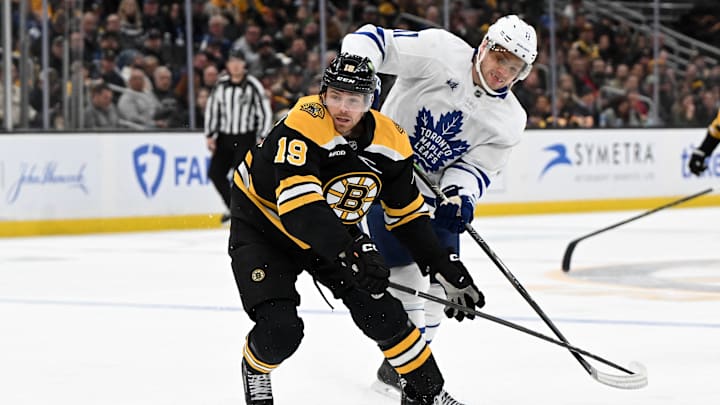 Feb 25, 2025; Boston, Massachusetts, USA; Boston Bruins center John Beecher (19) and Toronto Maple Leafs center Max Domi (11) battle for the puck during the second period at the TD Garden. Mandatory Credit: Brian Fluharty-Imagn Images Feb 25, 2025; Boston, Massachusetts, USA; Boston Bruins center John Beecher (19) and Toronto Maple Leafs center Max Domi (11) battle for the puck during the second period at the TD Garden. Mandatory Credit: Brian Fluharty-Imagn Images