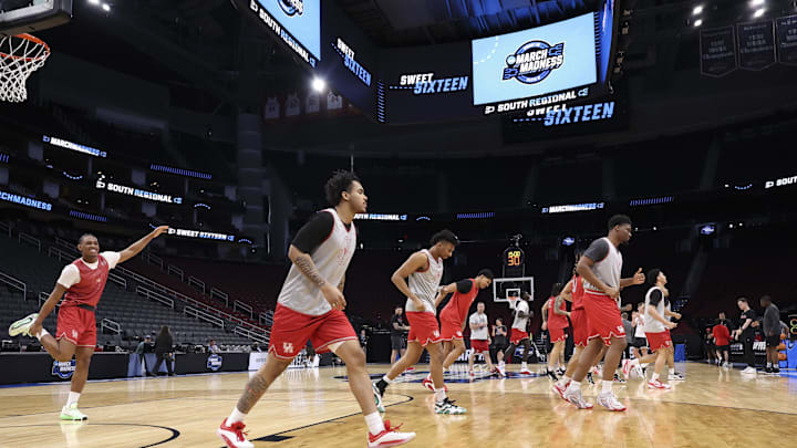 Mar 25, 2026; Houston, TX, USA; Houston Cougars players warm up during a practice session ahead of the south regional of the men's 2026 NCAA Tournament at Toyota Center. Mandatory Credit: Troy Taormina-Imagn Images Mar 25, 2026; Houston, TX, USA; Houston Cougars players warm up during a practice session ahead of the south regional of the men's 2026 NCAA Tournament at Toyota Center. Mandatory Credit: Troy Taormina-Imagn Images