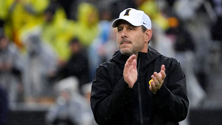 Iowa offensive coordinator Tim Lester watches warm ups Nov. 8, 2025 before a Big Ten Football game against the Oregon Ducks at Kinnick Stadium in Iowa City, Iowa.