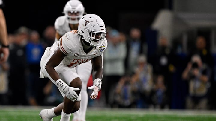Jan 10, 2025; Arlington, TX, USA; Texas Longhorns linebacker Colin Simmons (11) in action during the game between the Texas Longhorns and the Ohio State Buckeyes at AT&T Stadium. Mandatory Credit: Jerome Miron-Imagn Images