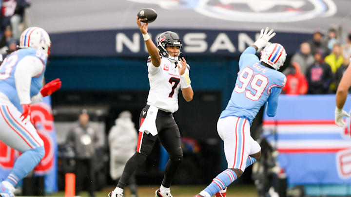 Jan 5, 2025; Nashville, Tennessee, USA;  Houston Texans quarterback C.J. Stroud (7) throws a pass against the Tennessee Titans during the first half at Nissan Stadium. Mandatory Credit: Steve Roberts-Imagn Images