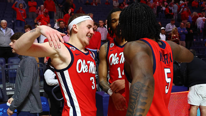 Feb 4, 2025; Oxford, Mississippi, USA; Mississippi Rebels guard Sean Pedulla (3), guard Dre Davis (14) and guard Jaylen Murray (5) react after defeating the Kentucky Wildcats at The Sandy and John Black Pavilion at Ole Miss. Mandatory Credit: Petre Thomas-Imagn Images Feb 4, 2025; Oxford, Mississippi, USA; Mississippi Rebels guard Sean Pedulla (3), guard Dre Davis (14) and guard Jaylen Murray (5) react after defeating the Kentucky Wildcats at The Sandy and John Black Pavilion at Ole Miss. Mandatory Credit: Petre Thomas-Imagn Images