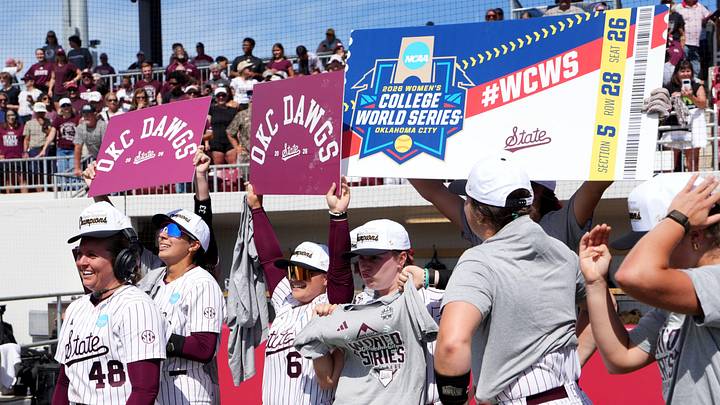 Mississippi State players celebrate as Delainey Everett (48) is interviewed following Game 3 of the NCAA softball Norman Super Regional between the University of Oklahoma Sooners and the Mississippi State Bulldogs at Love's Field in Norman, Okla., May, 24, 2026. Mississippi State players celebrate as Delainey Everett (48) is interviewed following Game 3 of the NCAA softball Norman Super Regional between the University of Oklahoma Sooners and the Mississippi State Bulldogs at Love's Field in Norman, Okla., May, 24, 2026.