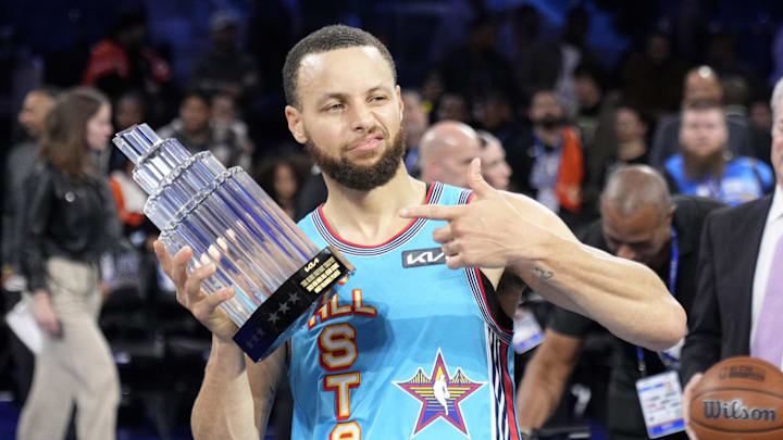 Feb 16, 2025; San Francisco, CA, USA; Shaq’s OGs guard Stephen Curry (30) of the Golden State Warriors celebrates with the MVP trophy after defeating Chuck’s Global Stars during the 2025 NBA All Star Game at Chase Center. Mandatory Credit: Kyle Terada-Imagn Images