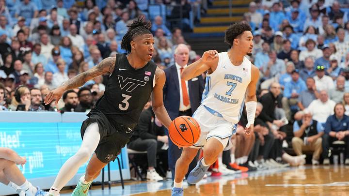 Feb 28, 2026; Chapel Hill, N.C.; Virginia Tech guard Ben Hammond (3) with the ball as North Carolina guard Seth Trimble (7) defends. Feb 28, 2026; Chapel Hill, N.C.; Virginia Tech guard Ben Hammond (3) with the ball as North Carolina guard Seth Trimble (7) defends.
