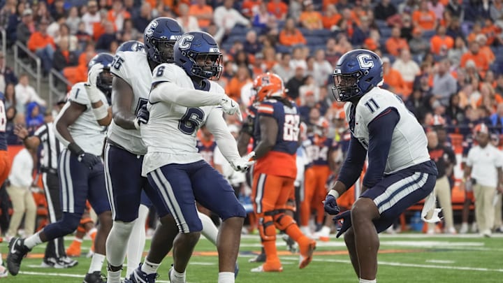 Sep 6, 2025; Syracuse, New York, USA; UConn Huskies linebacker Bryun Parham (6) reacts to a sack along with linebacker Donovan Branch (11) against the Syracuse Orange during the second half at JMA Wireless Dome. Mandatory Credit: Gregory Fisher-Imagn Images Sep 6, 2025; Syracuse, New York, USA; UConn Huskies linebacker Bryun Parham (6) reacts to a sack along with linebacker Donovan Branch (11) against the Syracuse Orange during the second half at JMA Wireless Dome. Mandatory Credit: Gregory Fisher-Imagn Images