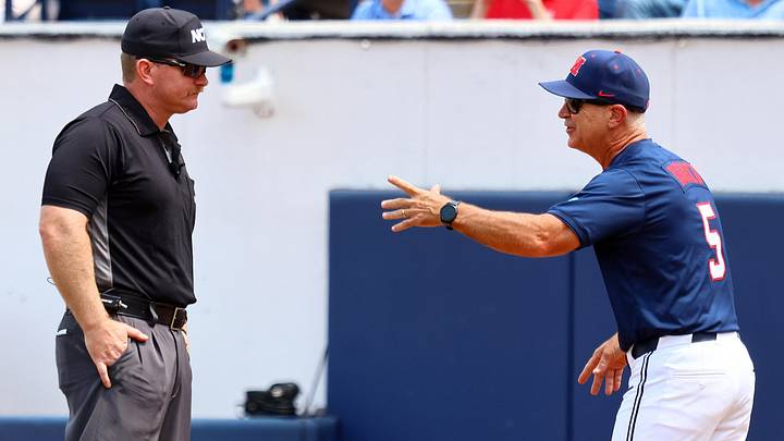Jun 1, 2025; Oxford, MS, USA; Mississippi Rebels head coach Mike Bianco reacts towards an umpire during the first inning against the Georgia Tech Yellowjackets. Mandatory Credit: Petre Thomas-Imagn Images Jun 1, 2025; Oxford, MS, USA; Mississippi Rebels head coach Mike Bianco reacts towards an umpire during the first inning against the Georgia Tech Yellowjackets. Mandatory Credit: Petre Thomas-Imagn Images