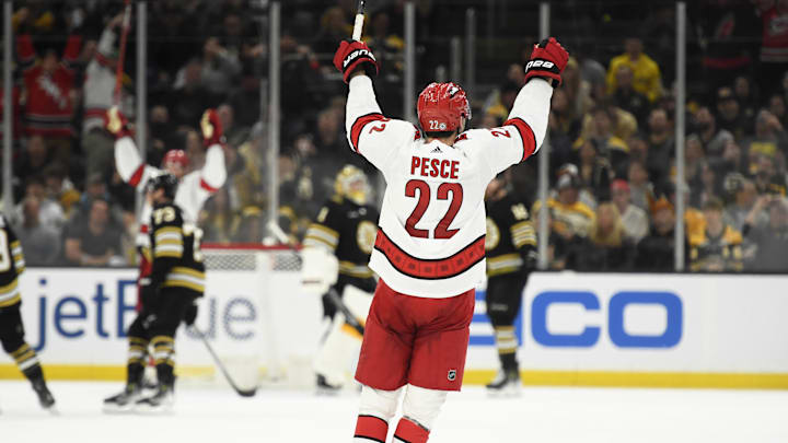 Apr 9, 2024; Boston, Massachusetts, USA; Carolina Hurricanes defenseman Brett Pesce (22) reacts