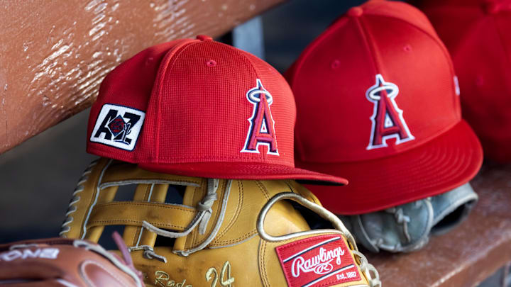 Detailed view of the Los Angeles Angels logo on a hat in the dugout during a spring training game at Camelback Ranch-Glendale in 2005.