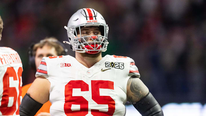 Jan 20, 2025; Atlanta, GA, USA; Ohio State Buckeyes offensive lineman Zen Michalski (65) against the Notre Dame Fighting Irish during the CFP National Championship college football game at Mercedes-Benz Stadium. Mandatory Credit: Mark J. Rebilas-Imagn Images