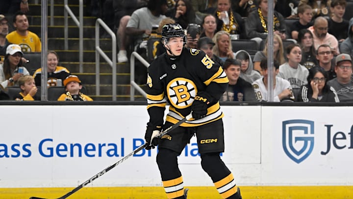 Sep 29, 2025; Boston, Massachusetts, USA;  Boston Bruins defenseman Billy Sweezey (58) skates during the second period against the Philadelphia Flyers at TD Garden. Mandatory Credit: Eric Canha-Imagn Images