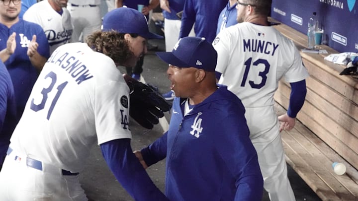 Dodgers manager Dave Roberts (30) congratulates starting pitcher Tyler Glasnow (31) after he pitched seven inning with seven strikeouts during an MLB game against the St. Louis Cardinals at Dodger Stadium on Aug. 4.
