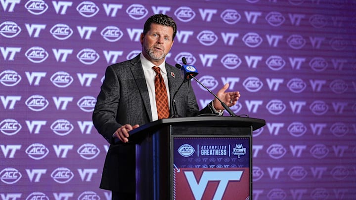 Jul 23, 2024; Charlotte, NC, USA; Virginia Tech head coach Brent Pry answers questions from the media during the ACC Kickoff at Hilton Charlotte Uptown. Mandatory Credit: Jim Dedmon-Imagn Images