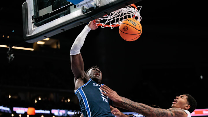 Mar 12, 2026; Kansas City, MO, USA; BYU Cougars forward Keba Keita (13) dunks during the second half against the Houston Cougars at T-Mobile Center. Mandatory Credit: William Purnell-Imagn Images
