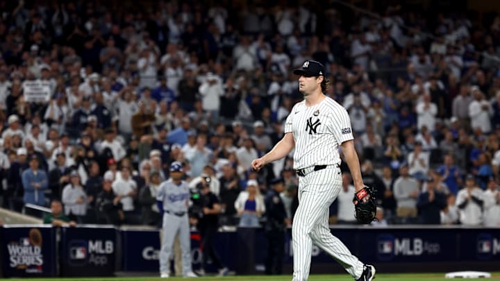 Oct 30, 2024; New York, New York, USA; New York Yankees pitcher Gerrit Cole (45) is removed from the game during the seventh inning against the Los Angeles Dodgers in game five of the 2024 MLB World Series at Yankee Stadium. Mandatory Credit: Vincent Carchietta-Imagn Images