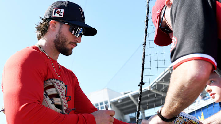 Mar 13, 2025; Port Charlotte, Florida, USA; Washington Nationals right fielder Dylan Crews (3) signs autographs before the start of the game against the Tampa Bays Rays during spring training at Charlotte Sports Park.